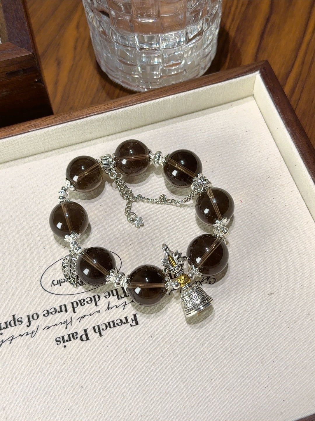 Smoky Quartz Bracelet with Feather & Bell · Black Tea