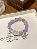 Amethyst, Golden Rutile & Rose Quartz Bracelet · Balance & Luck