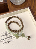 Agarwood & Hetian Jade Butterfly Bracelet · Rebirth